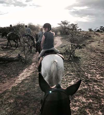The group crossing a hippo trail